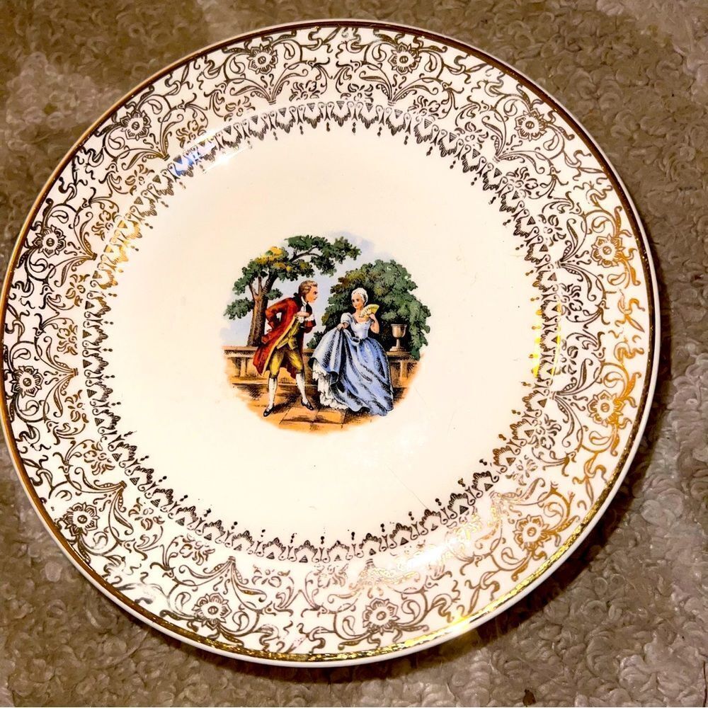 6 century by Salem gold rimmed plates